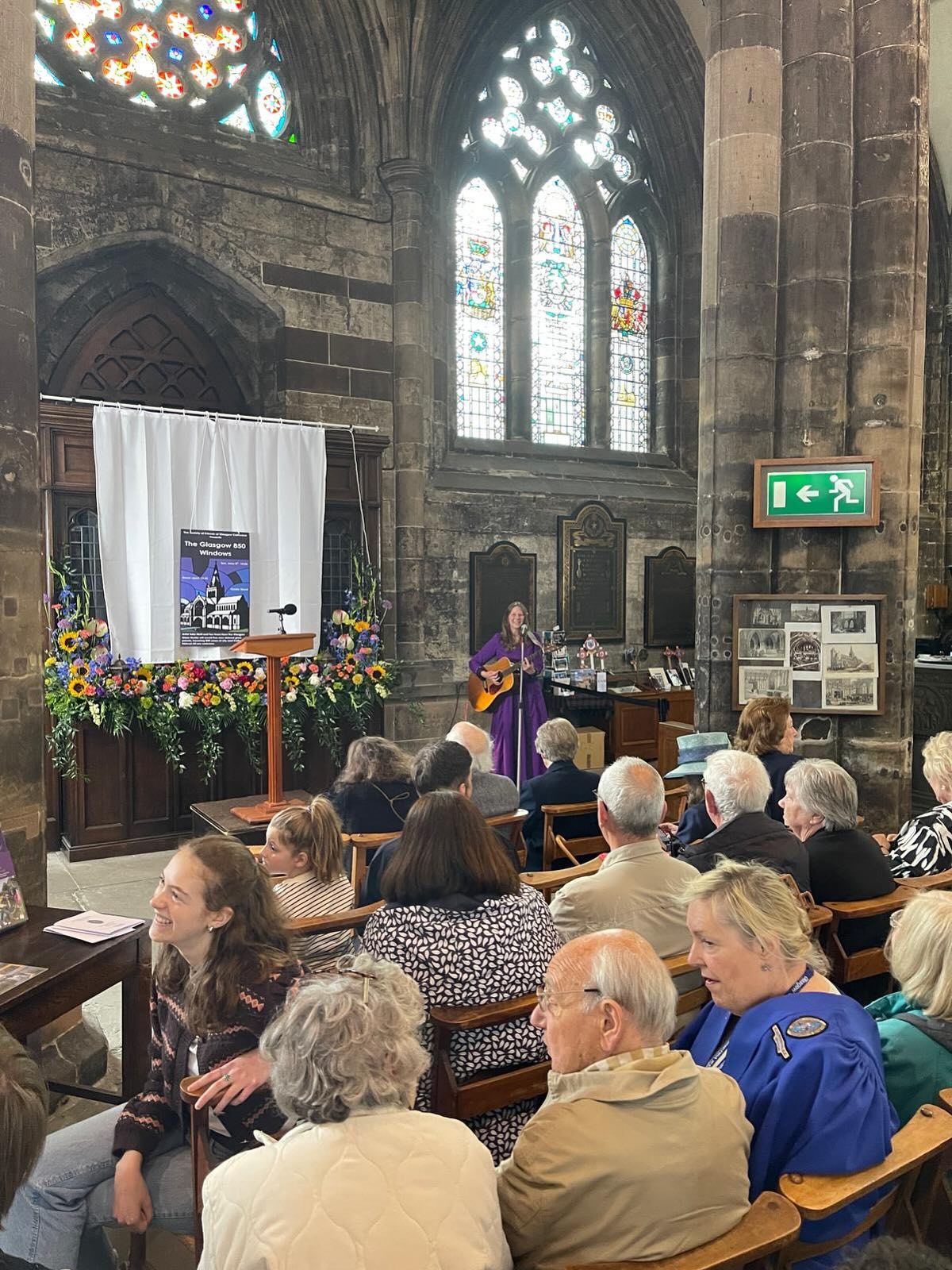 Connie MacLeod - Author of William Ridley and the Celtic Cross singing at Glasgow Cathedral in celebration of Glasgow's 850th anniversary and unveiling of new stained glass windows by Talia Blatt