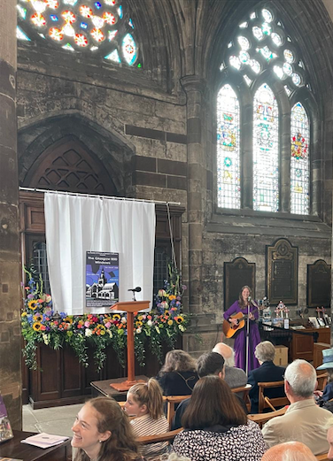 Connie MacLeod singing at Glasgow Cathedral in honour of the city's 850th anniversary.